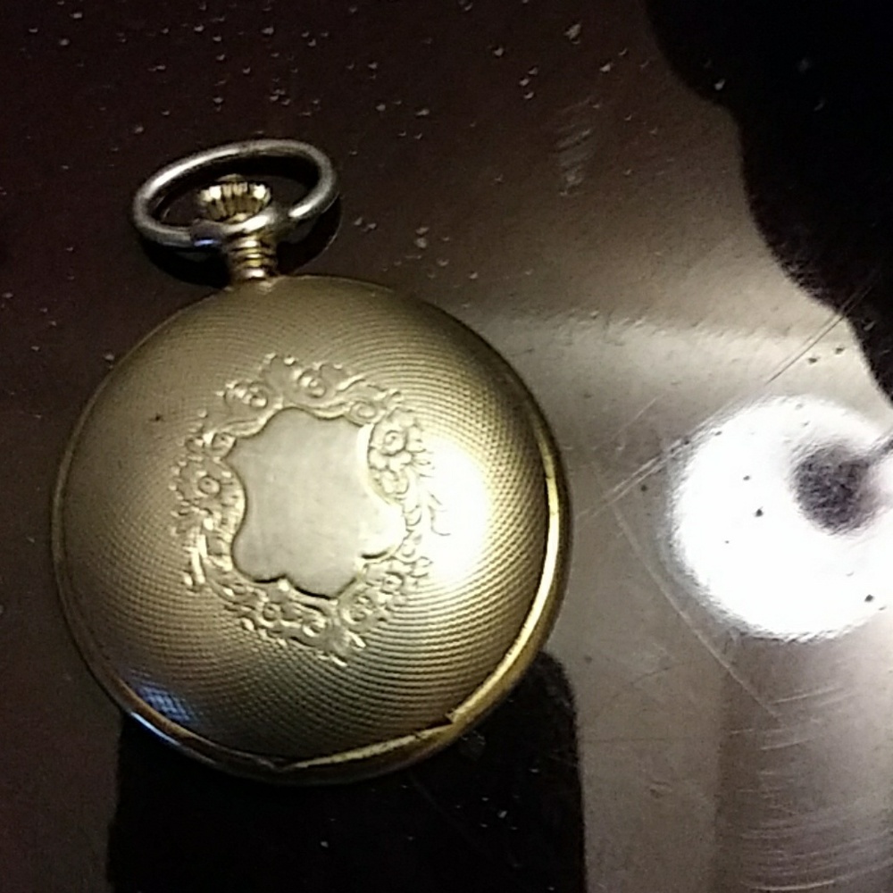An Majetime pocket watch.